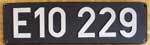 Deutschland (BRD), Lokschild der DB: E10 229, Guss-Aluminium-Gro, Frontschild. Schild mit unterschiedlichem Bgen an den Zweiern.